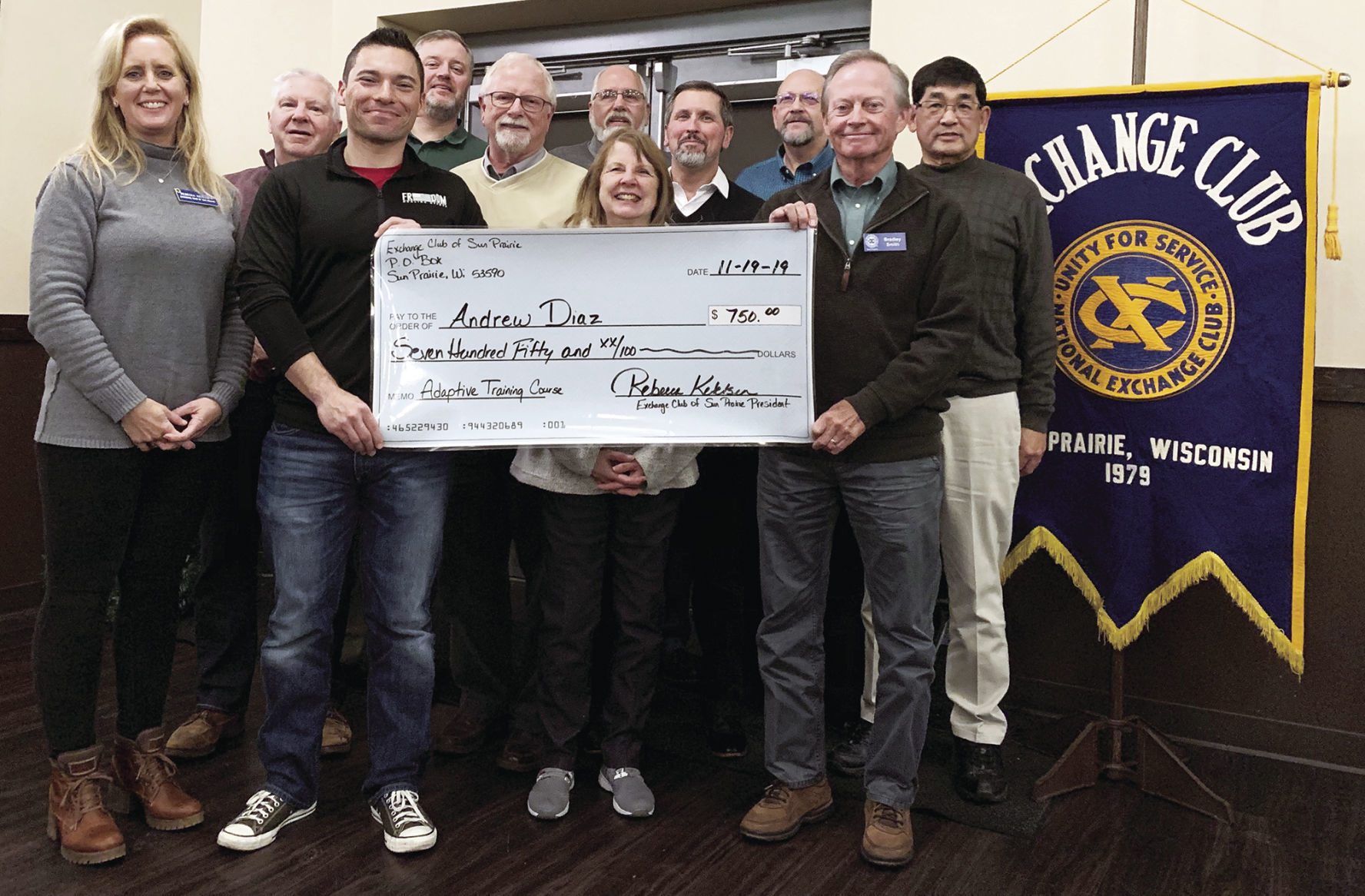 Exchange Club gives check for training course